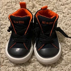 Orange and black converse